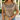 Woman wearing a patterned top and denim shorts against a white wall