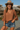 woman wearing a brown blouse and brown hat and jean shorts. La dolce fiona