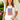 Woman wearing a white t-shirt with an American flag design on a plain background